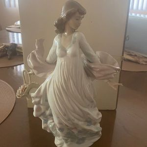Lladro “Spring Splendor” figurine.  Like new with original box and packaging